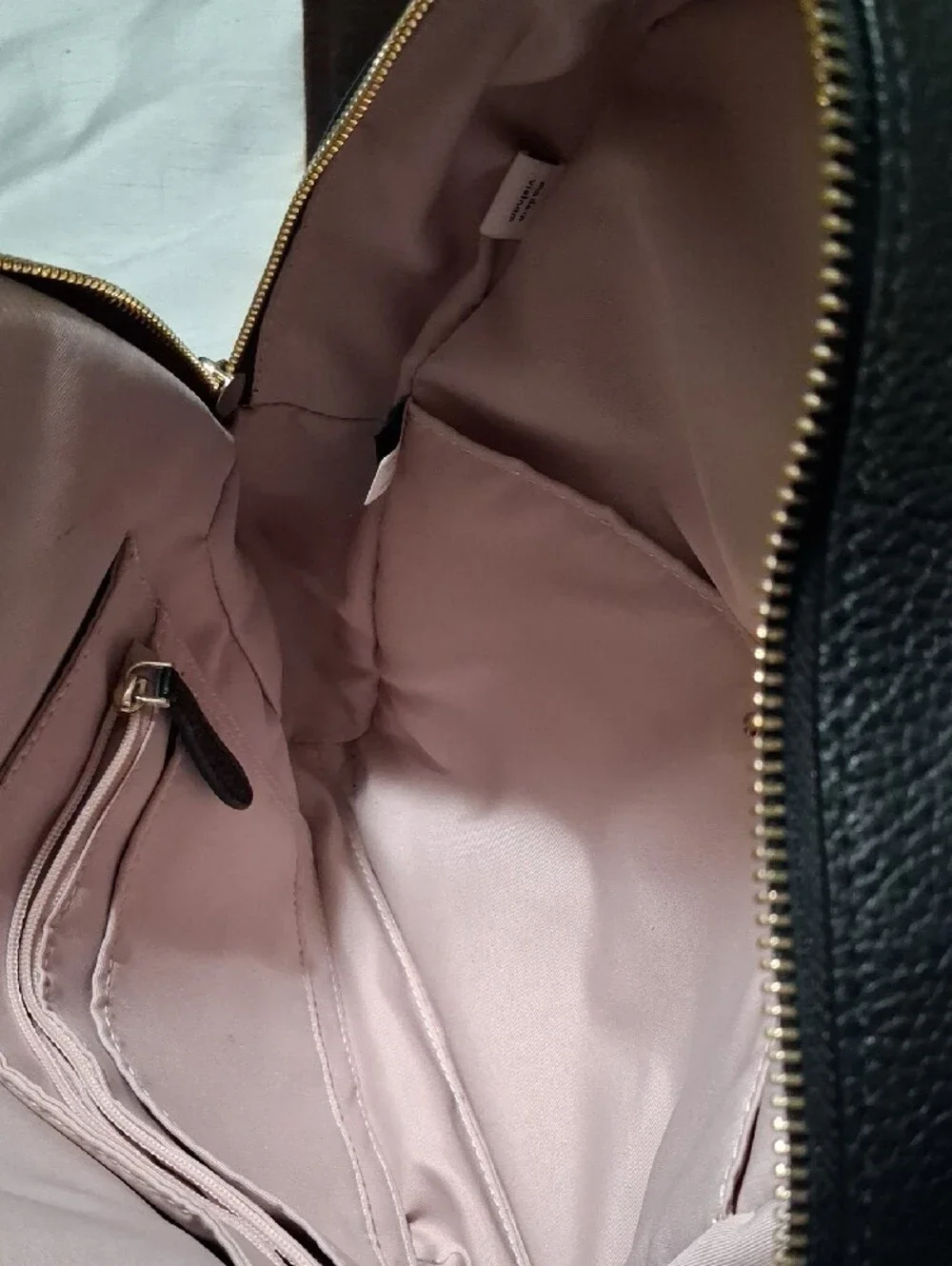 kate spade black pebbled leather backpack with gold hardware